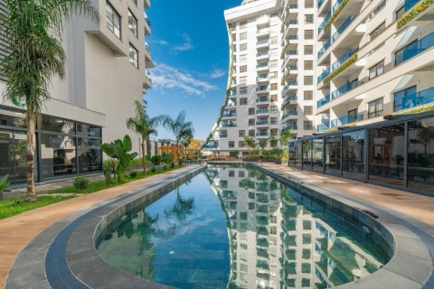 آپارتمان در  Mahmutlar ، ترکیه 1 خوابه ، 61 متر مربع.  شماره 215544 - 1